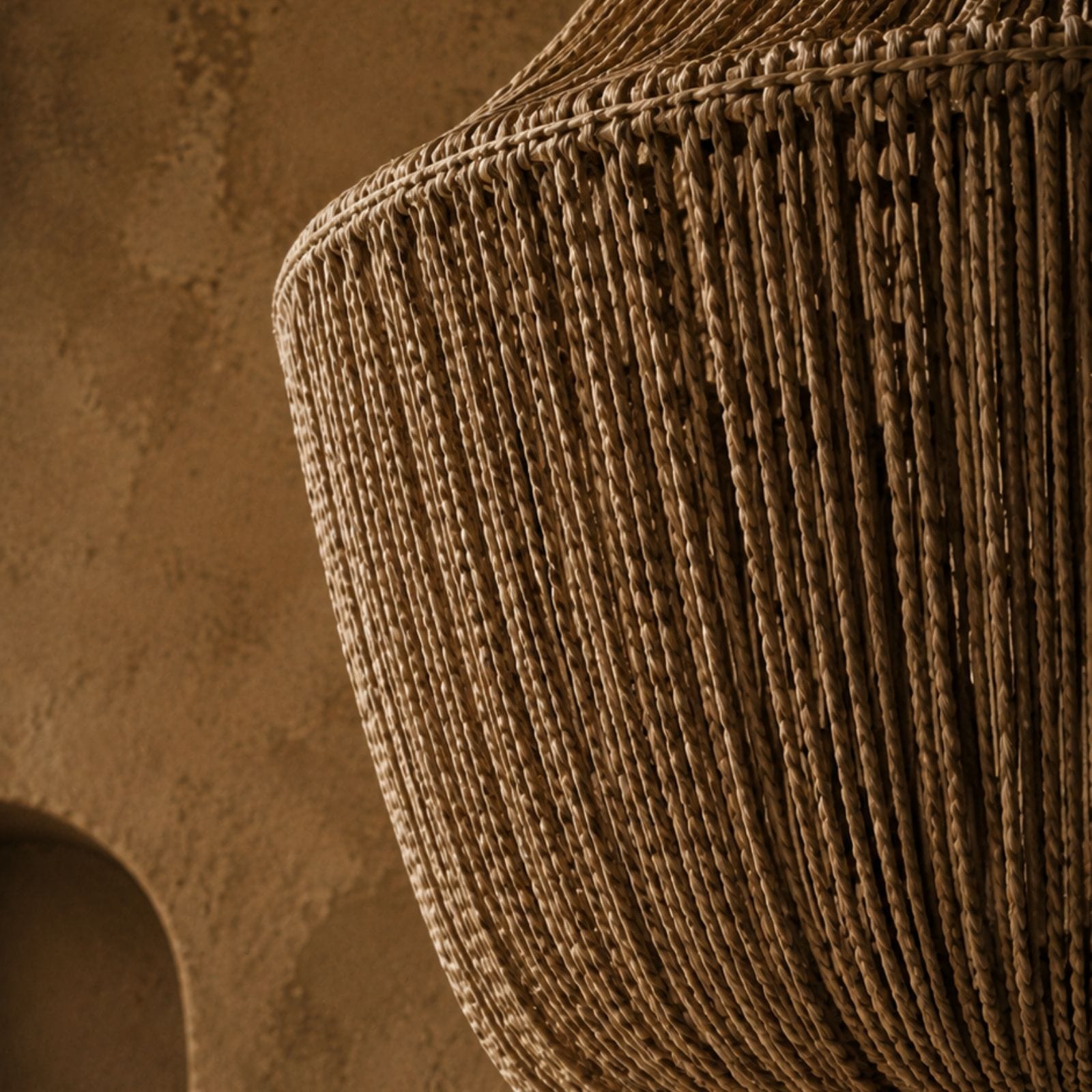 SOUL is a handwoven jute pendant lamp from BOHO’s RAYAA Collection, crafted with natural fibers, braided tassels, and a warm earthy glow for soulful interiors.